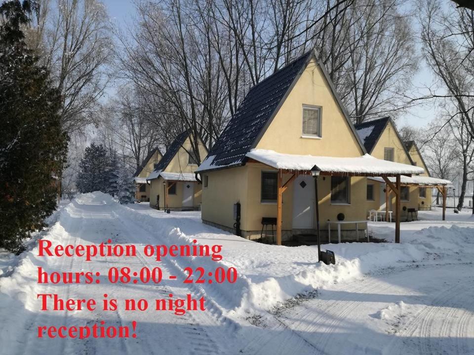 a house covered in snow with the words revision operating there is no night reception at Ifjúsági és Munkásszállás in Mezőkövesd