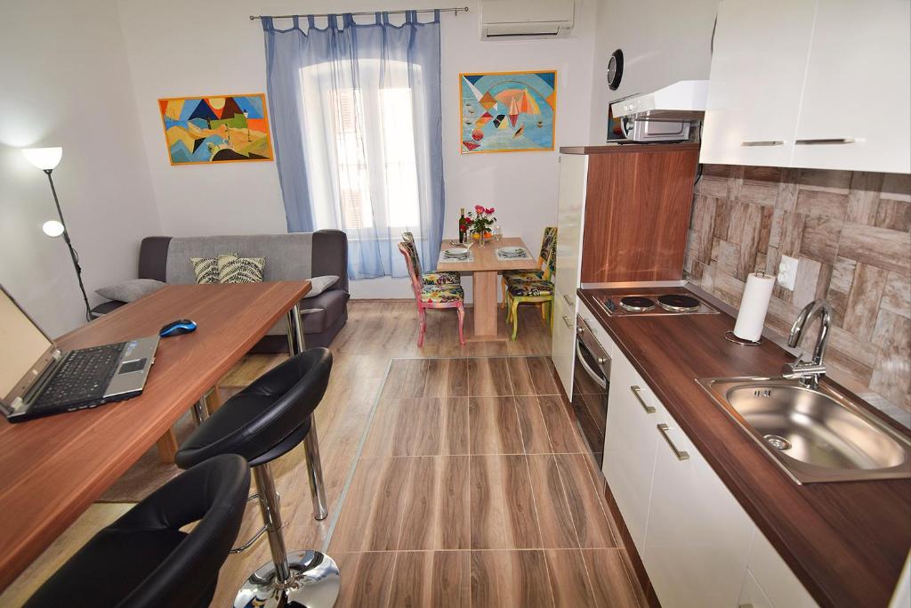 Kuchyň nebo kuchyňský kout v ubytování Apartment Nerea