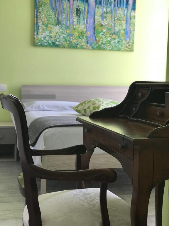 A bed or beds in a room at Bed & Breakfast Oltrepo
