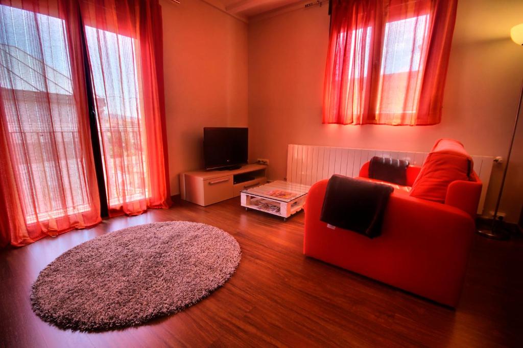 TV a/nebo společenská místnost v ubytování La Casa del Mercat