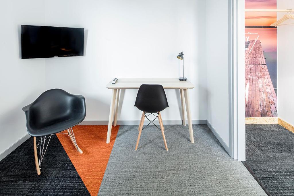 TV a/nebo společenská místnost v ubytování Norrland YMCA Hostel Umeå