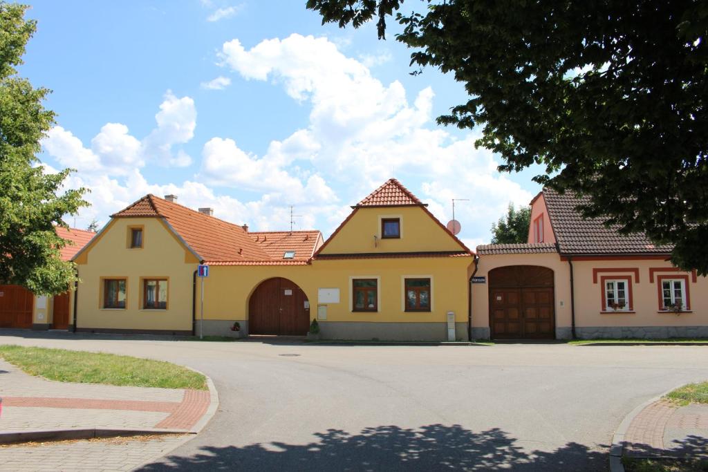 a row of houses in a street with a driveway at Jihoceska Pohoda in Třeboň