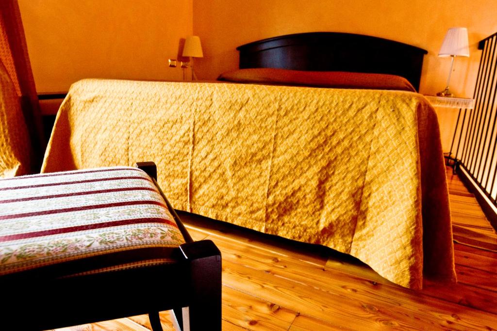 Postel nebo postele na pokoji v ubytování Locanda la Casetta