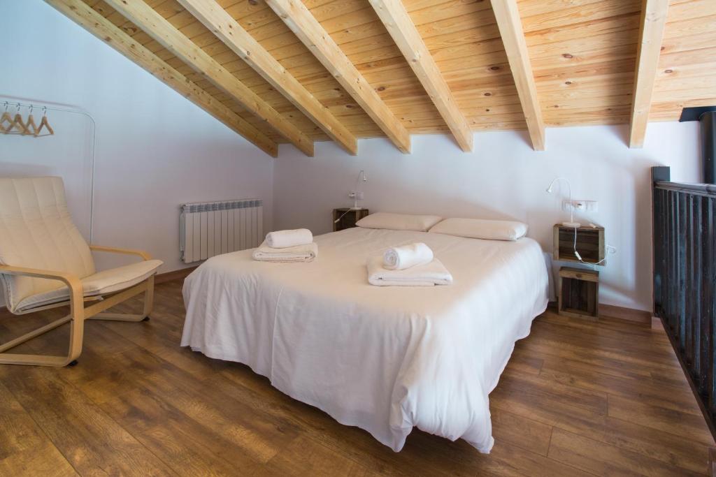 Postel nebo postele na pokoji v ubytování Os Feleitos