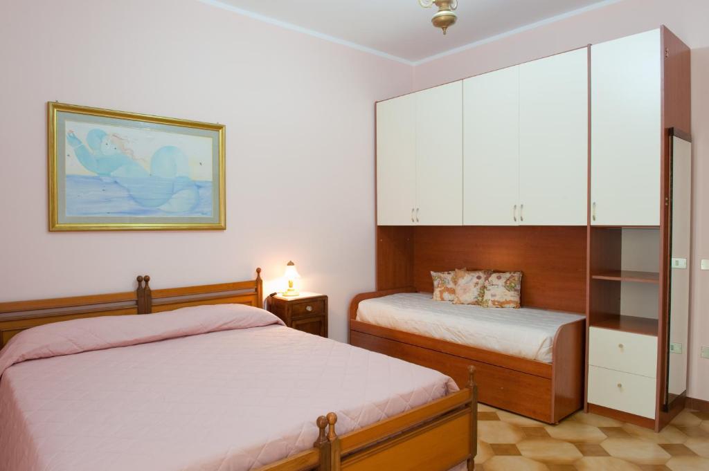 Postel nebo postele na pokoji v ubytování B&B Nova Siri