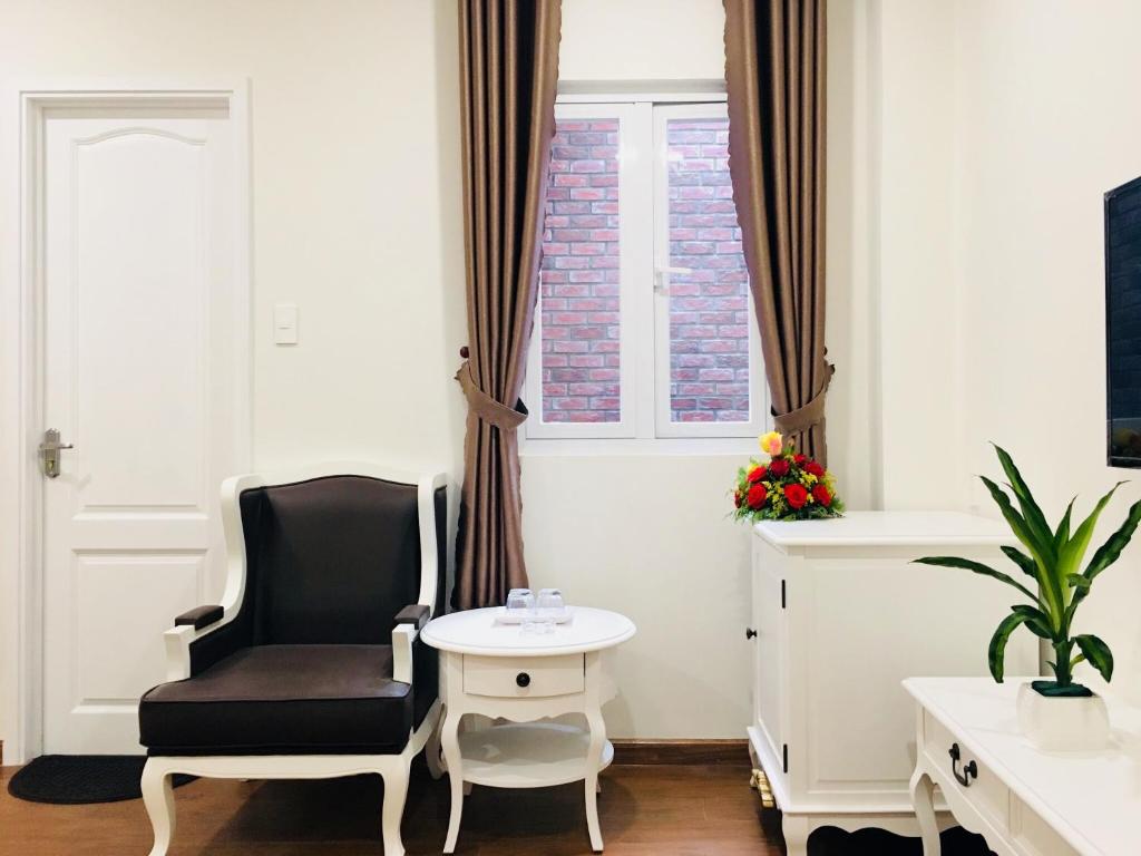 Posezení v ubytování Carita Hotel