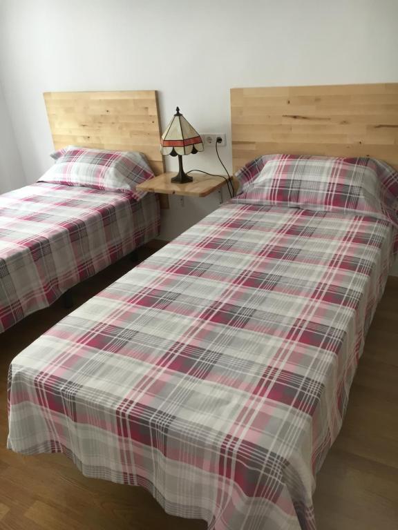 Postel nebo postele na pokoji v ubytování Apartamento Almirante Baldasano