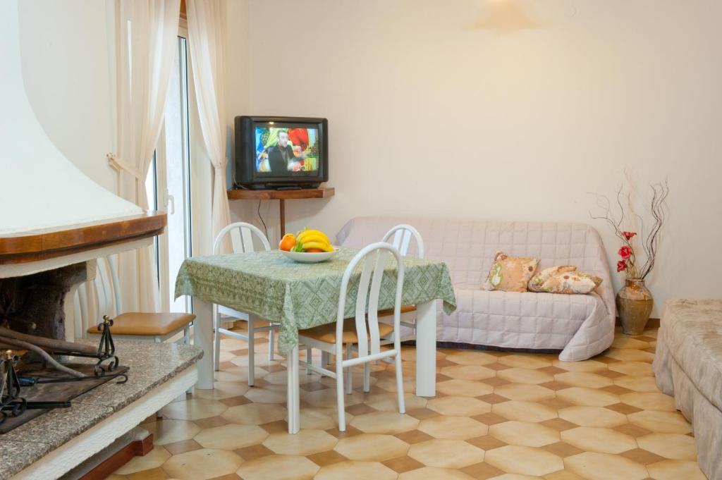 TV a/nebo společenská místnost v ubytování B&B Nova Siri