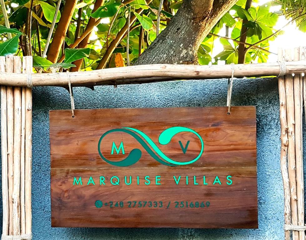 תעודה, פרס, שלט או מסמך אחר המוצג ב-Marquise & Infinity villas