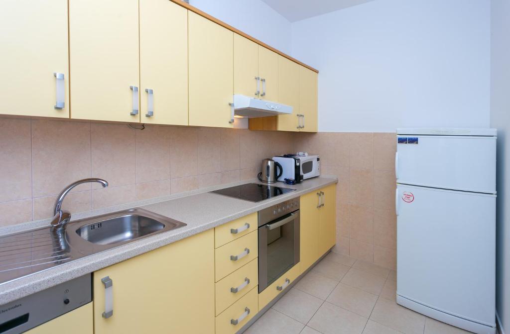 Kuchyňa alebo kuchynka v ubytovaní Apartments Stipisic