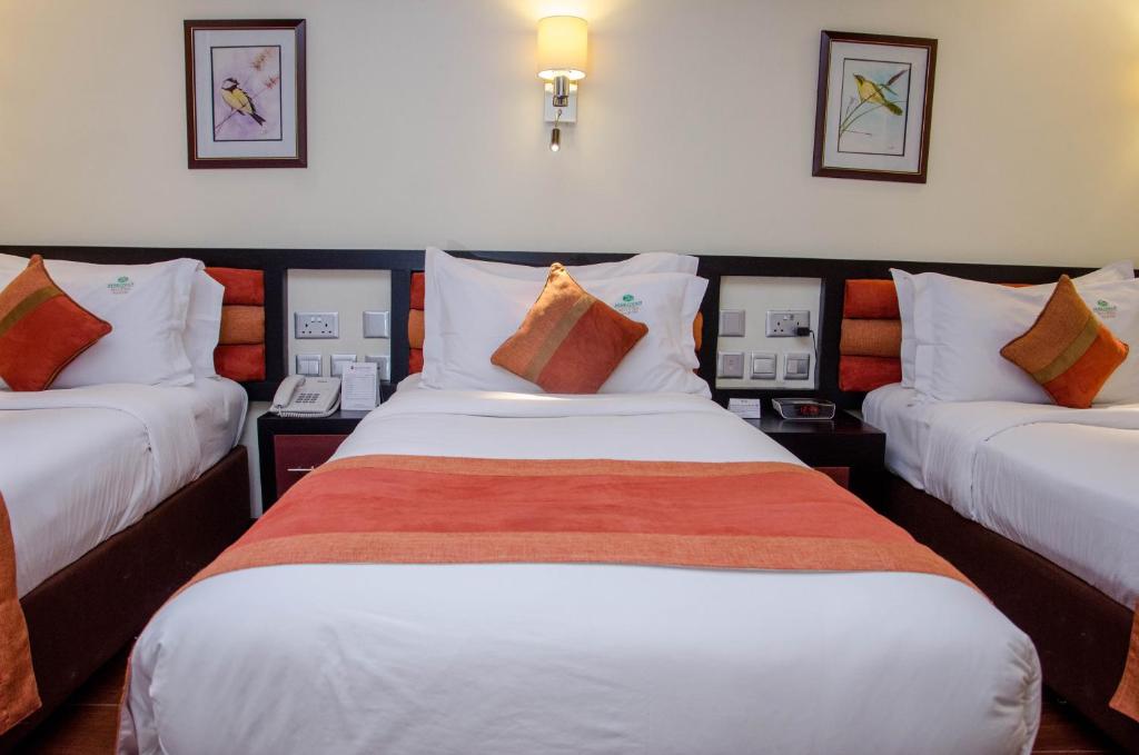 Postel nebo postele na pokoji v ubytování Best Western Plus Meridian Hotel