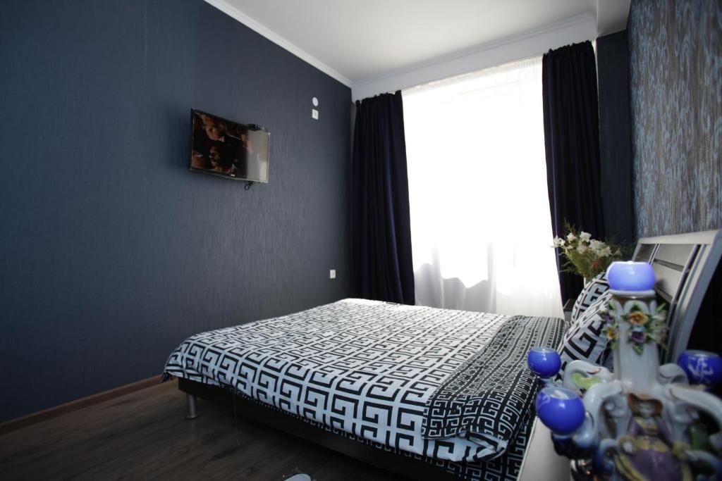Postel nebo postele na pokoji v ubytování Mia B&B Old Tbilisi