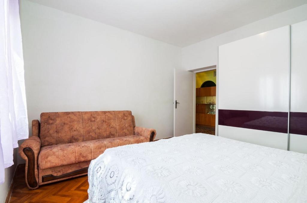 Postel nebo postele na pokoji v ubytování Apartments Cvita Ugljan