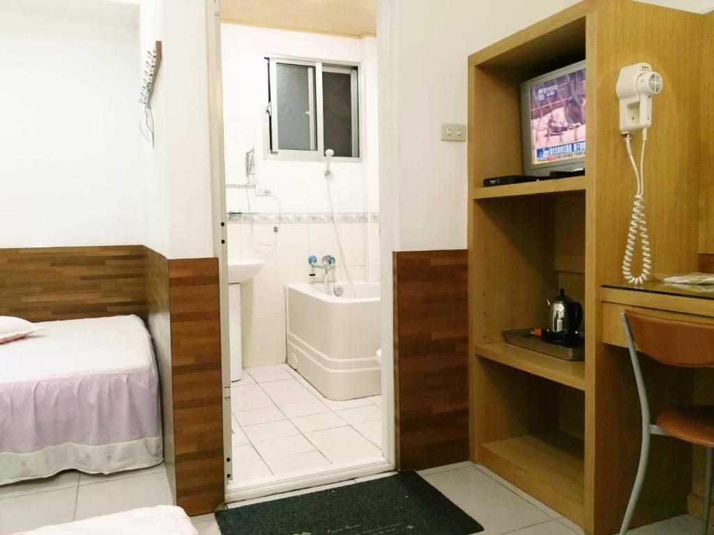 Koupelna v ubytování Qun Feng Hotel
