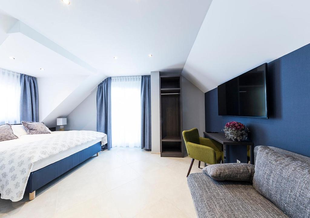 Postel nebo postele na pokoji v ubytování Hotel Tommasi