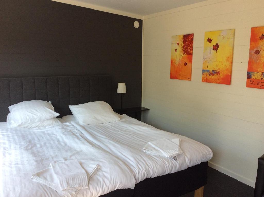 Postel nebo postele na pokoji v ubytování Gamla Bryggeriet Bed & Breakfast