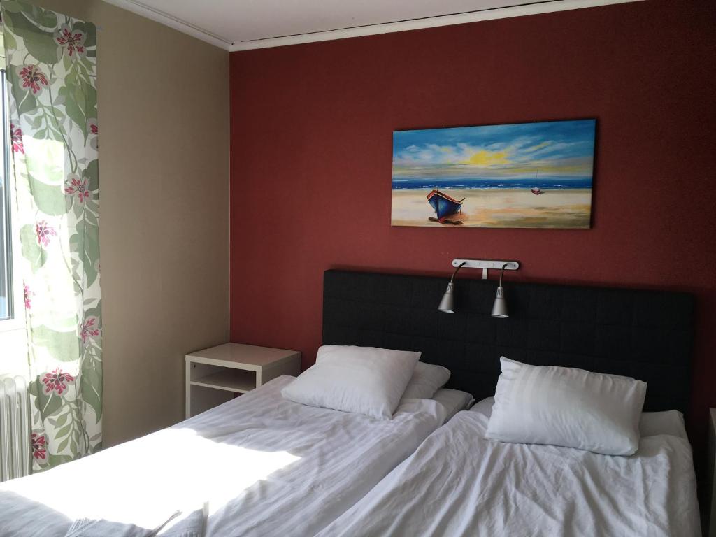 Postel nebo postele na pokoji v ubytování Gamla Bryggeriet Bed & Breakfast