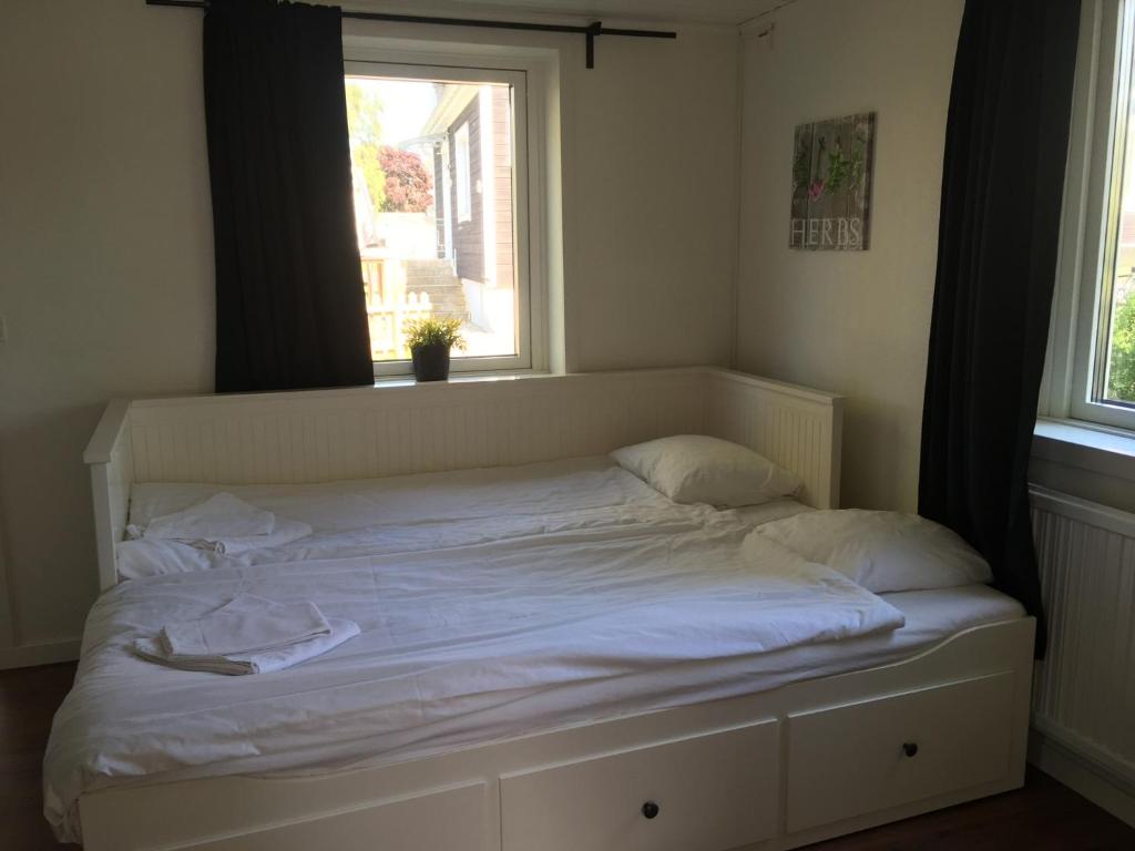Postel nebo postele na pokoji v ubytování Gamla Bryggeriet Bed & Breakfast