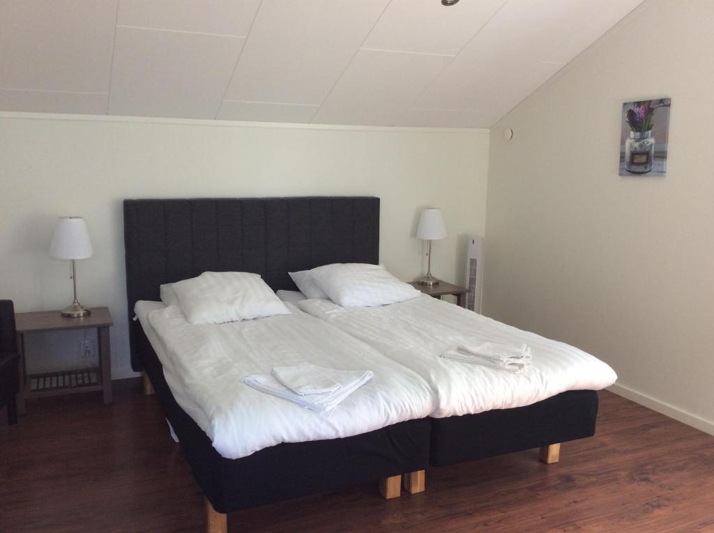 Postel nebo postele na pokoji v ubytování Gamla Bryggeriet Bed & Breakfast
