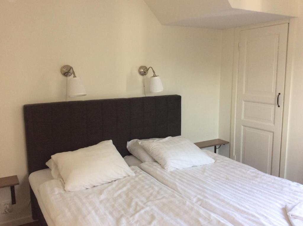 Postel nebo postele na pokoji v ubytování Gamla Bryggeriet Bed & Breakfast