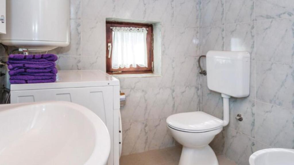 Kúpeľňa v ubytovaní Apartment Gina