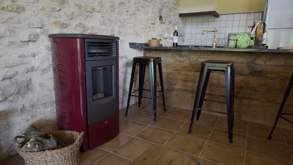 Kuchyň nebo kuchyňský kout v ubytování Masia El Mirador del Tiempo