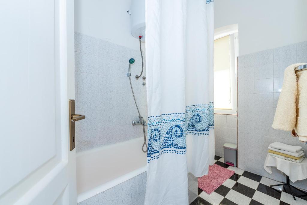 Ванная комната в Apartmani Rina