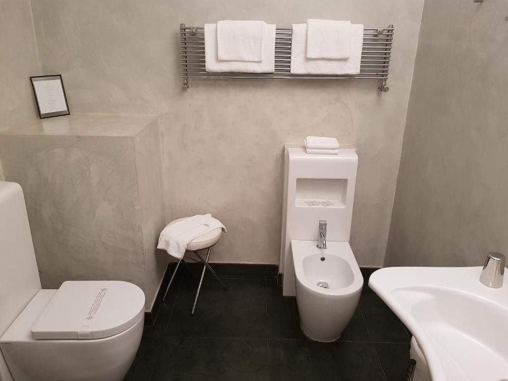 Koupelna v ubytování MA Hotel