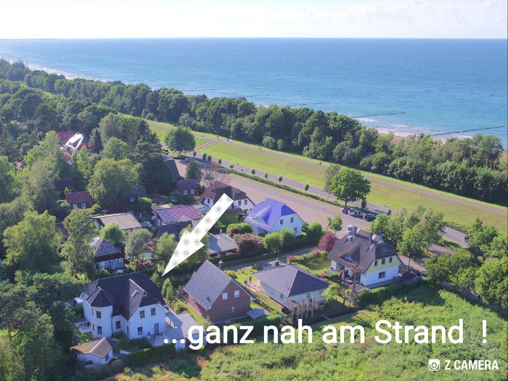 an aerial view of a house with the ocean at Ostseevilla Dietlinde in Zingst
