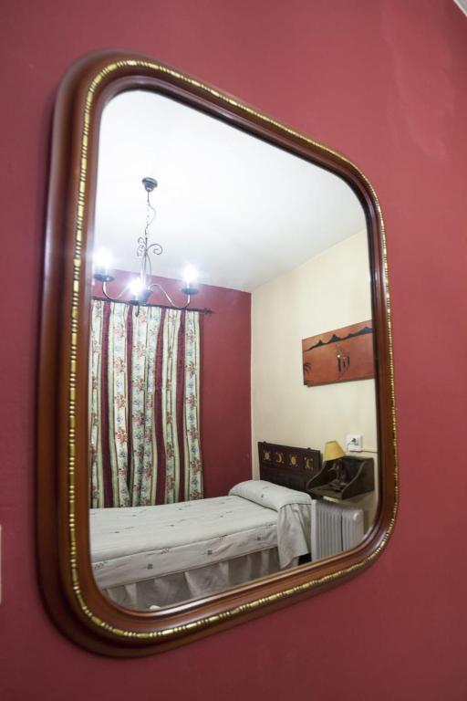 Postel nebo postele na pokoji v ubytování Casa Rural Calecha