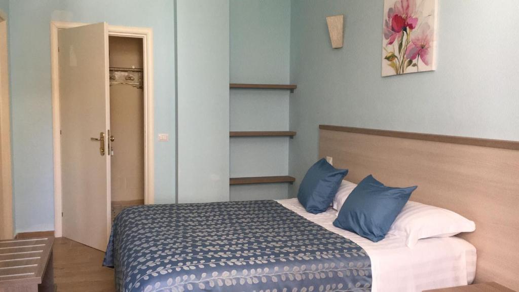 Postel nebo postele na pokoji v ubytování La Conchiglia
