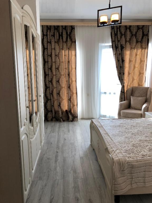 Postel nebo postele na pokoji v ubytování Lilu