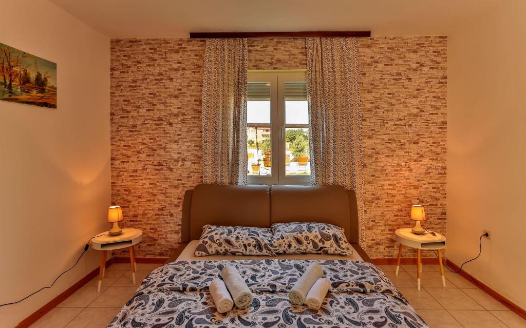 Postel nebo postele na pokoji v ubytování Apartments Dora Victoria Dream