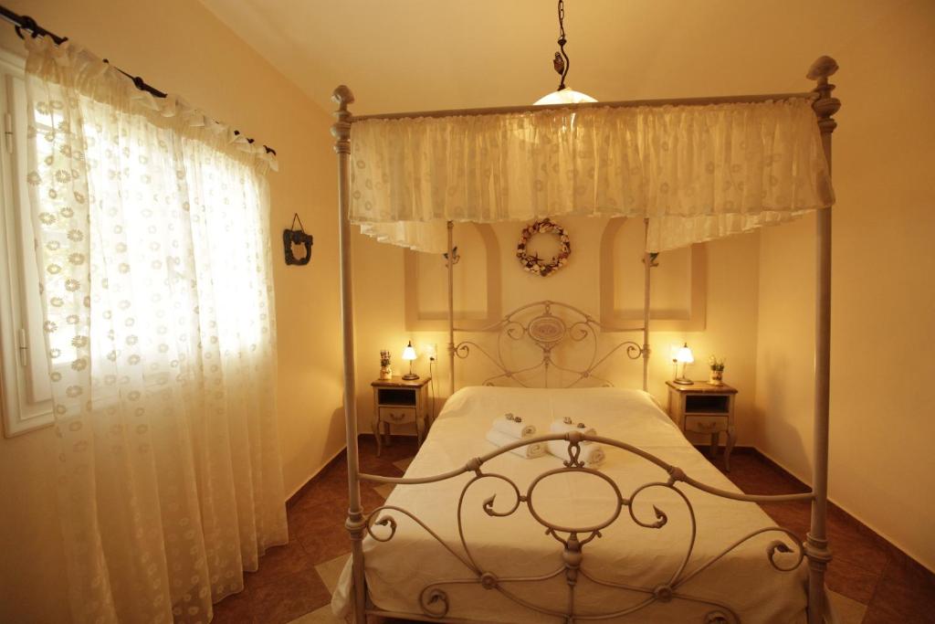Postel nebo postele na pokoji v ubytování Butterfly View Suites