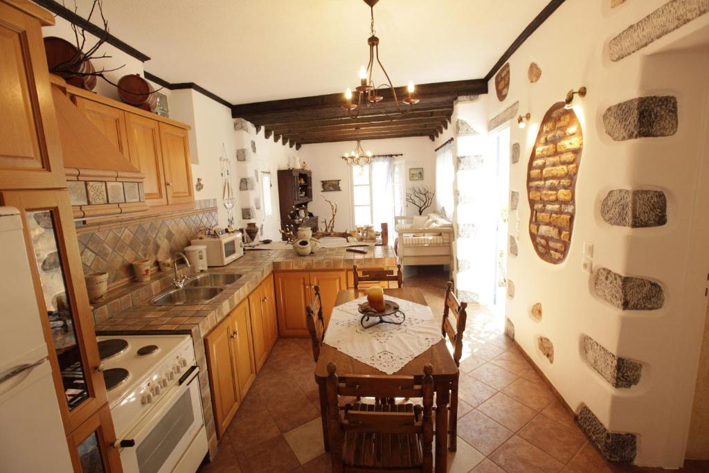 Kuchyň nebo kuchyňský kout v ubytování Butterfly View Suites