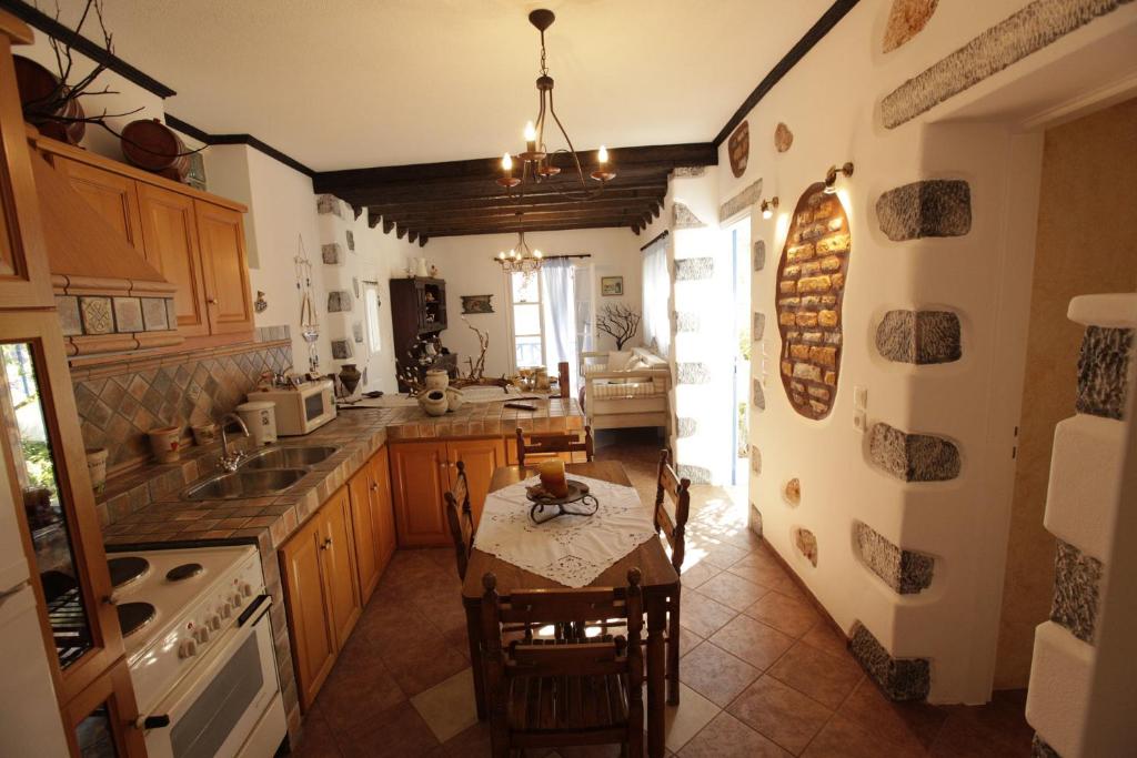 Kuchyň nebo kuchyňský kout v ubytování Butterfly View Suites