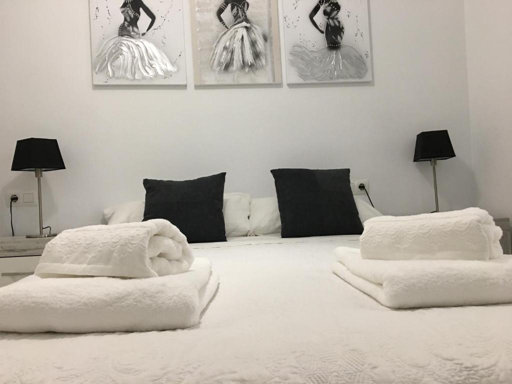 Postel nebo postele na pokoji v ubytování Casa de Corralón