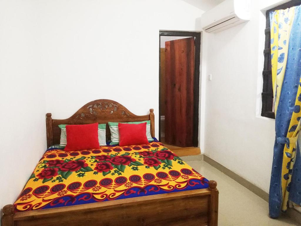 Postel nebo postele na pokoji v ubytování 20 House Arugam