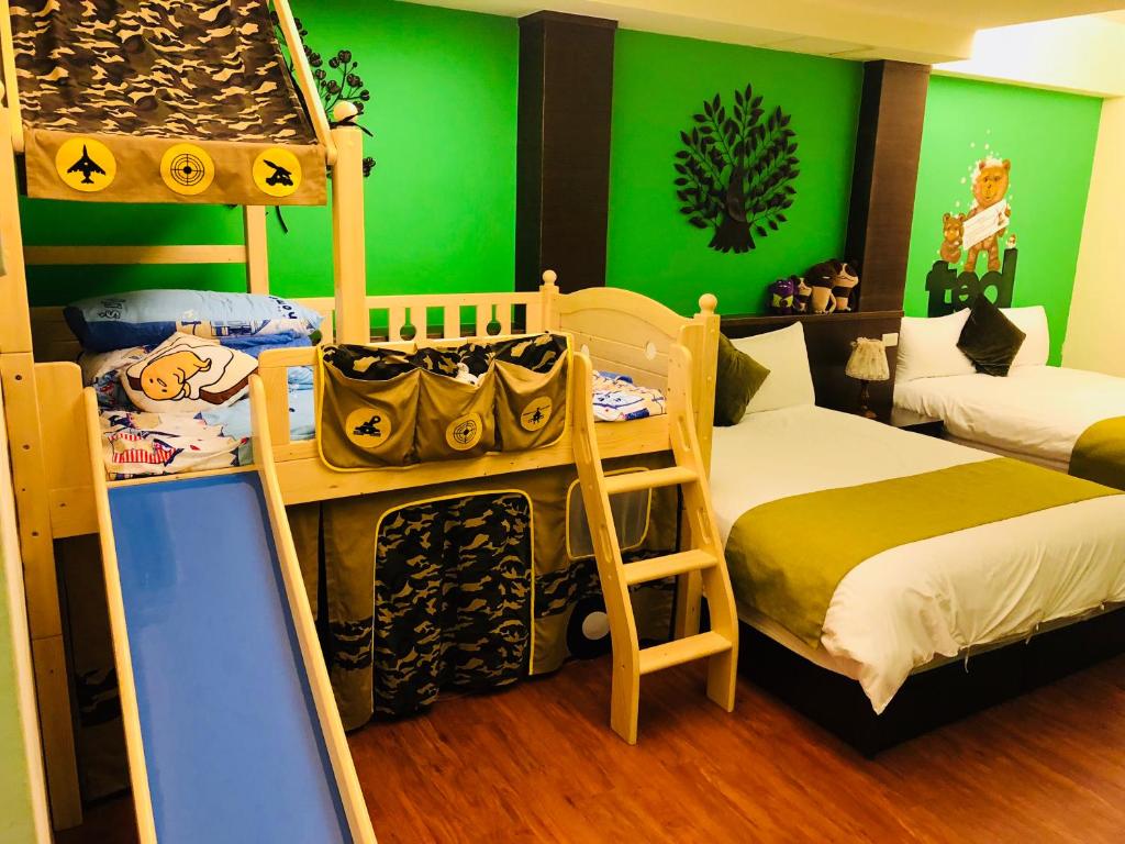 Postel nebo postele na pokoji v ubytování E-Phone Homestay