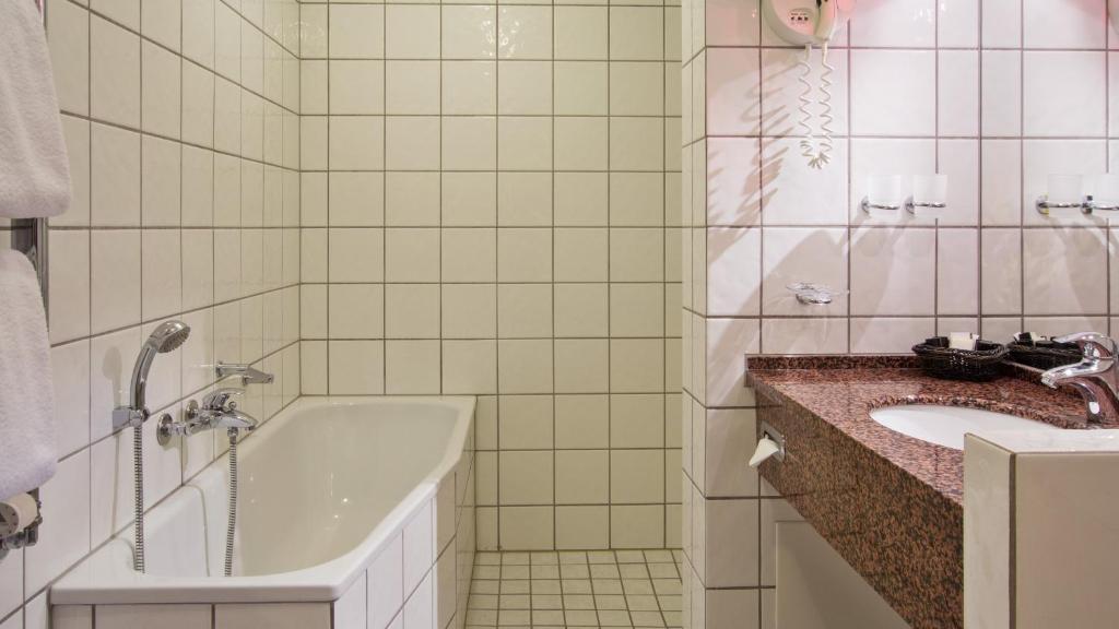 Koupelna v ubytování Hotel Knudsens Gaard
