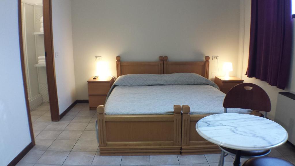 Posteľ alebo postele v izbe v ubytovaní Hotel Firenze 2000