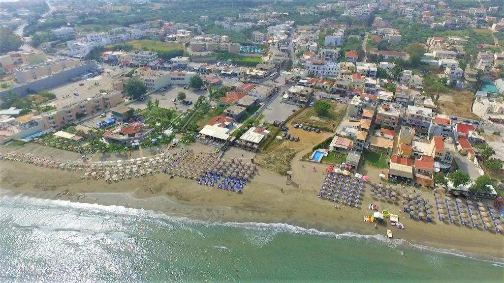 an aerial view of a beach with a crowd of people at Atrion Resort Hotel in Agia Marina Nea Kydonias