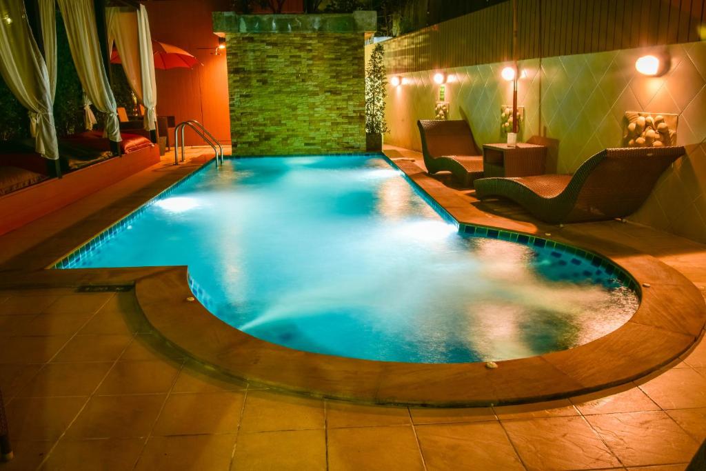 Bazén v ubytování Mhonsa Hotel nebo v jeho okolí