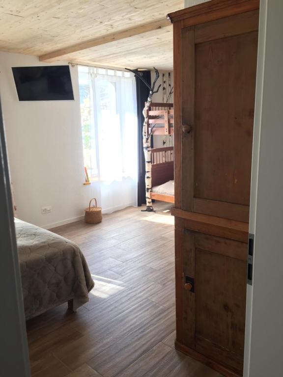 Postel nebo postele na pokoji v ubytování La Ferme des Arêtes