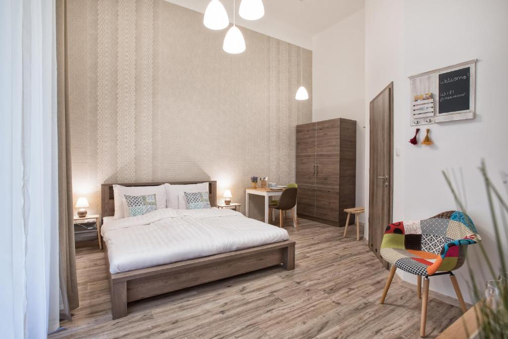 Postel nebo postele na pokoji v ubytování Budapest Passage 1
