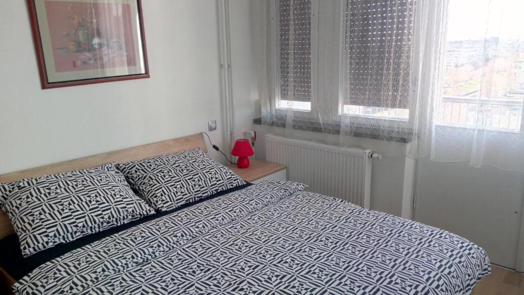 Posteľ alebo postele v izbe v ubytovaní Apartmani Borko