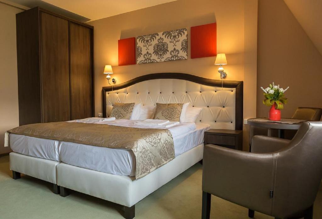 Postel nebo postele na pokoji v ubytování Sáppusztai Vendégház