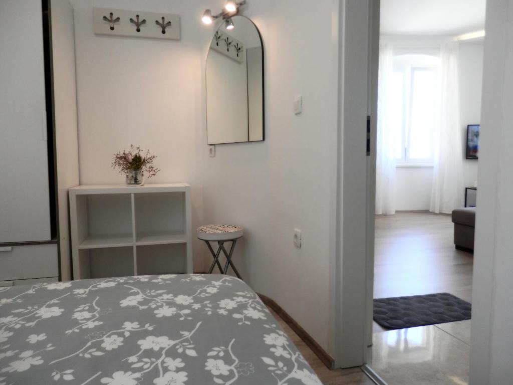 Łóżko lub łóżka w pokoju w obiekcie City Center Premium Apartment