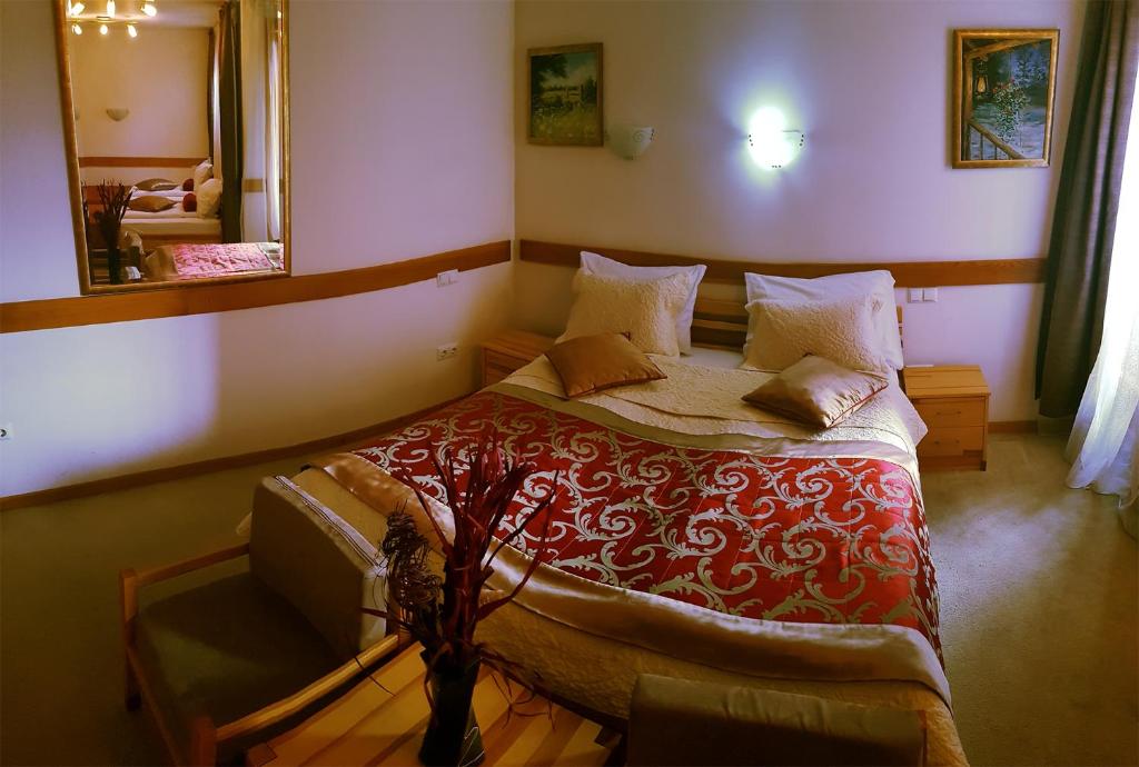 Postel nebo postele na pokoji v ubytování Hotel Berr