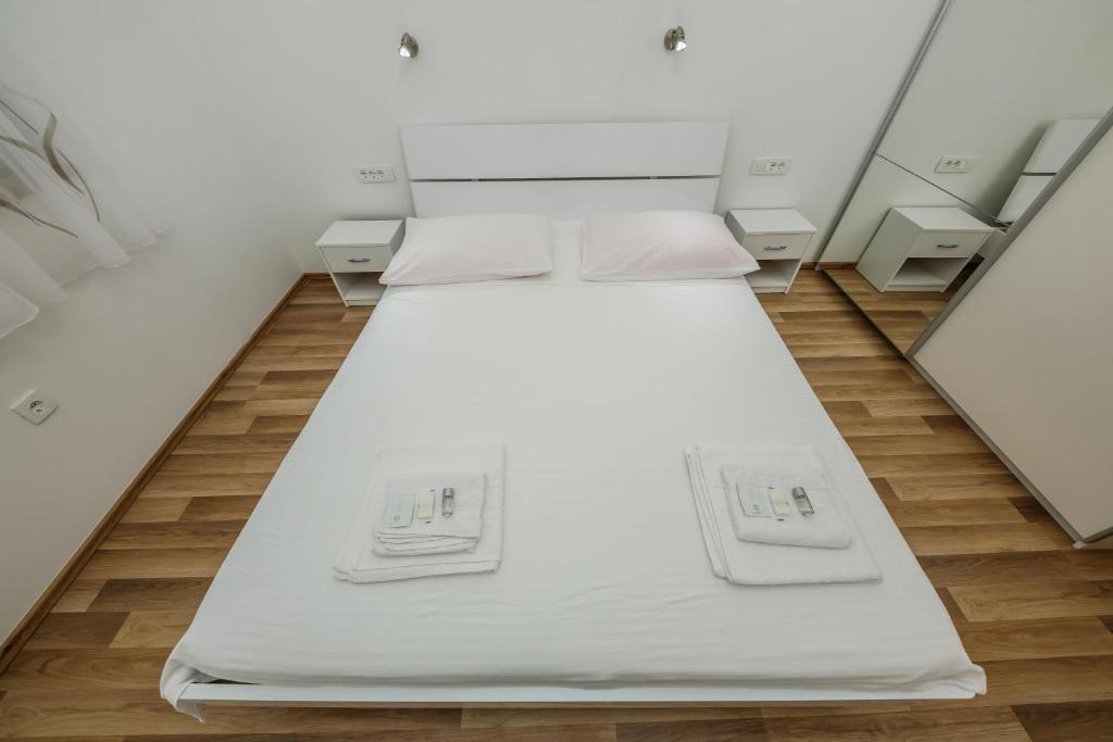 Posteľ alebo postele v izbe v ubytovaní Apartments Selak